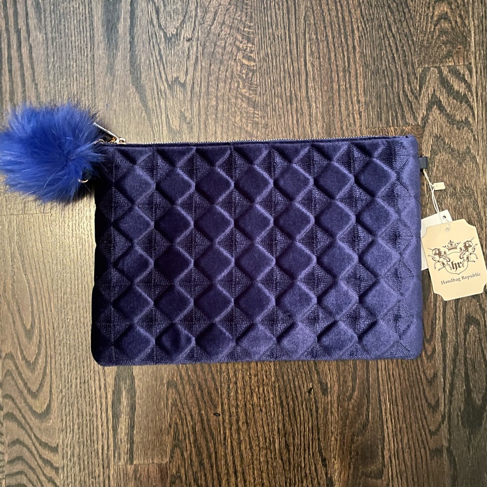 Pompom navy velvet clutch